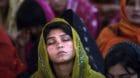 A Pakistani Christian woman prays during an Easter mass at a church in a Christian neighborhood of Islamabad, Pakistan, Sunda