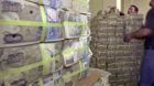Workers prepare to destroy a batch of 5,000 Greek drachma banknotes (14.67 Euros-12.82 dlrs) at the Greek National Mint in At