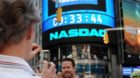 epa03223996 The Facebook logo on the display at the NASDAQ headquarters in Times Square after co-founder Mark Zuckerberg ra