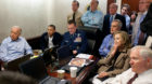 President Barack Obama and Vice President Joe Biden, along with with members of the national security team, receive an update