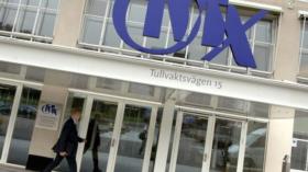 A man enters the headquarters of the Nordic bourse operator OMX in Stockholm, Sweden, in this Sept. 19, 2006 photo. Nasdaq an