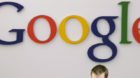 File - In this Oct. 2, 2006 file photo, a Google receptionist works at the front desk in the company's office in New York. Eu
