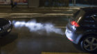 Fumes from a car's exhaust evaporate in the cold winter air, pictured on January 5, 2010 on Badenerstrasse street in Zurich,