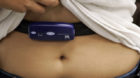 FILE - In this Thursday, Sept. 17, 2009 file photo, a 15-year-old girl has her sensor checked before starting a series of phy