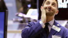 FILE - In this Tuesday, Dec. 11, 2012 file photo, specialist Christian Sanfilippo works on the floor of the New York Stock Ex