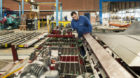 Armen Dzemaili works at a machine on the factory floor of Pestalozzi + Co AG in Dietikon in the canton of Zurich, Switzerland