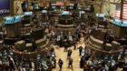 New York Stock Exchange workers finish up trading minutes before the closing bell at the Exchange, Tuesday, April 3, 2007 in