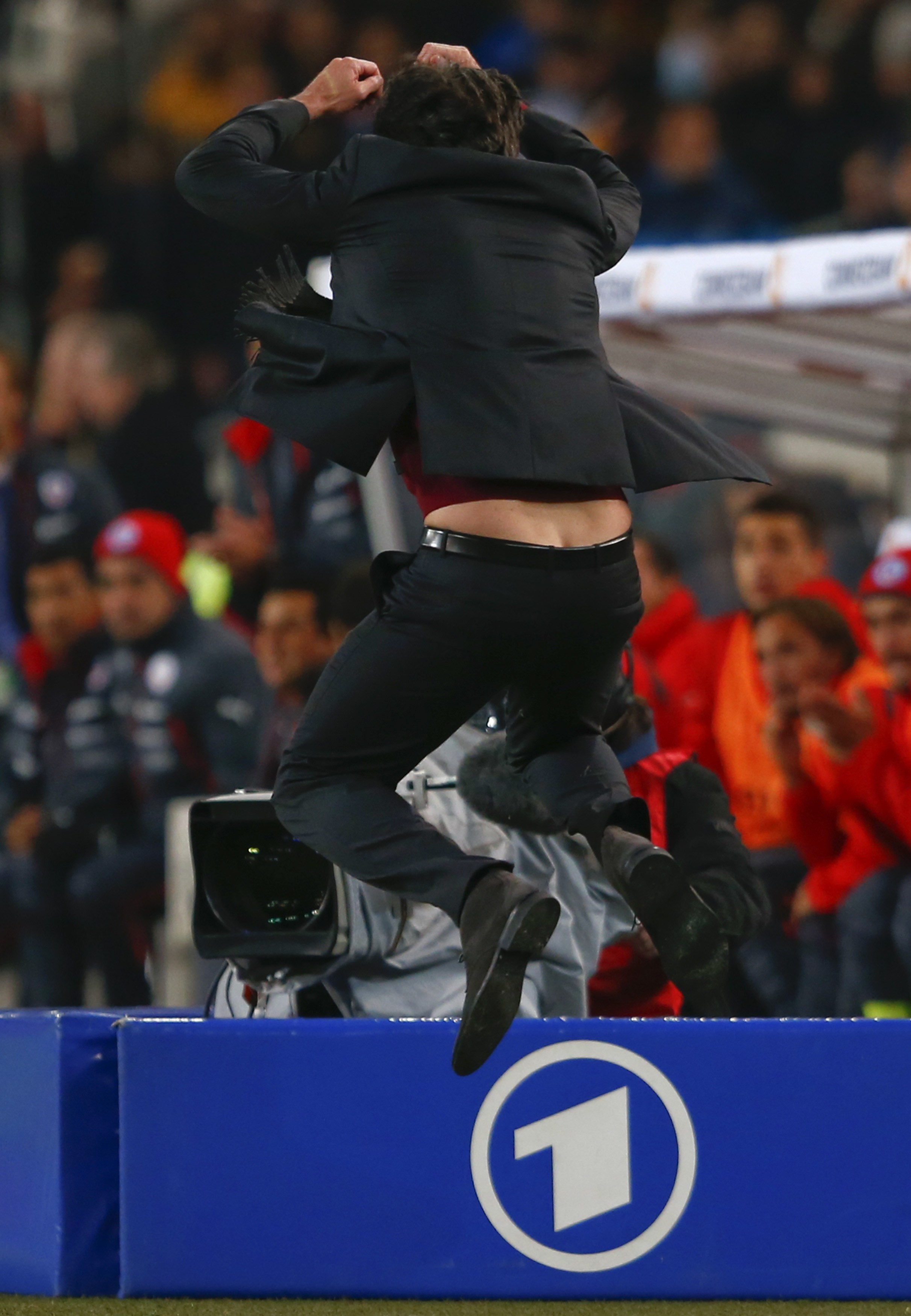 German national team coach Joachim Loew reacts during their international friendly soccer match against Chile in Stuttgart March 5, 2014.  REUTERS/Michael Dalder(GERMANY - Tags: SPORT SOCCER)