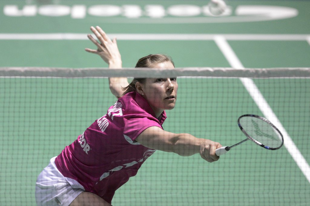 Switzerland's Sabrina Jaquet returns a shuttlecock to Bulgaria's Petya Nedelcheva during their women's singles first round match at the Badminton Swiss Open tournament in the St. Jakobshalle in Basel, Switzerland, on Wednesday, March 13, 2013. (KEYSTONE/ 