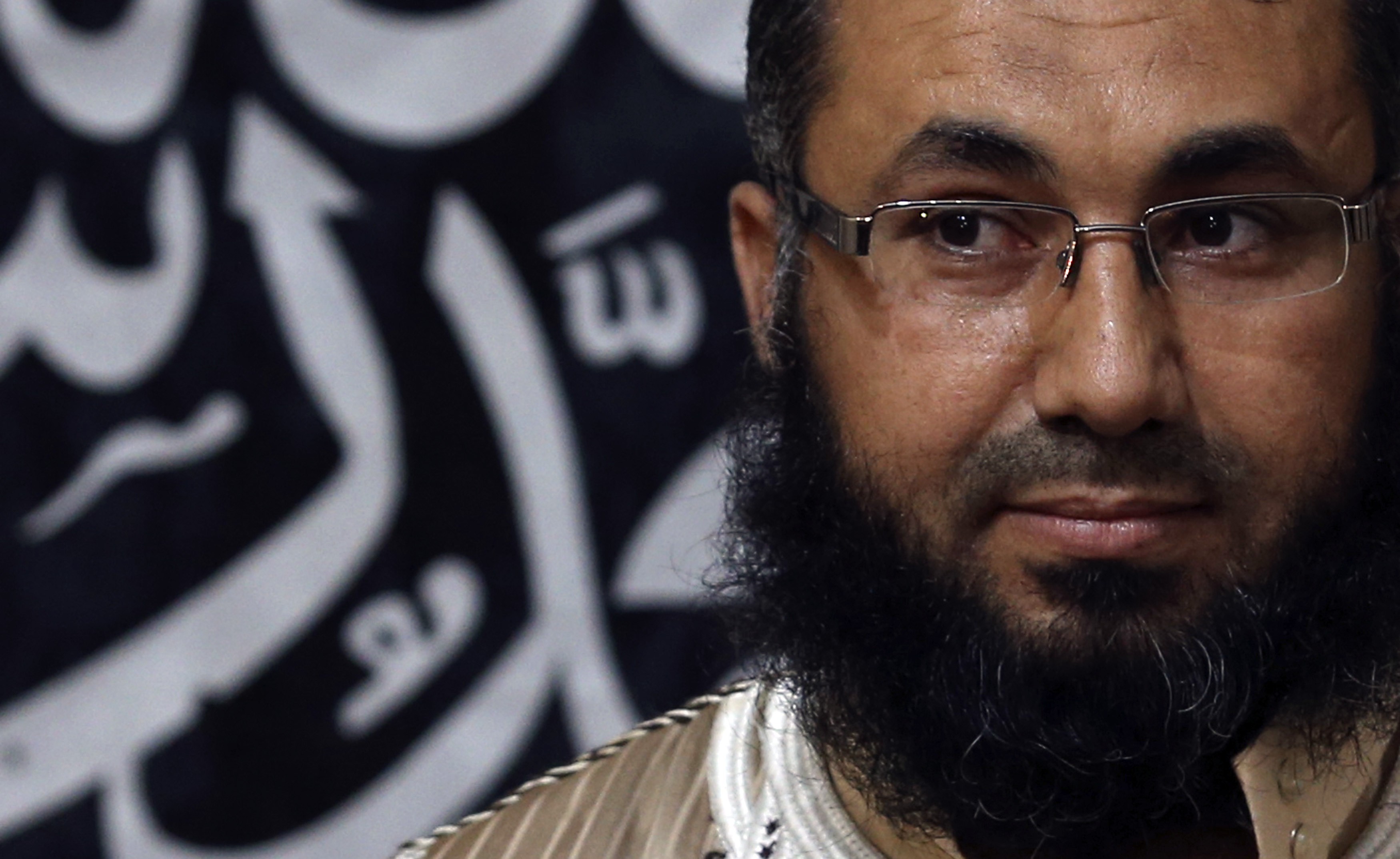 Mohamed Zahawi, head of the Benghazi brigade of Ansar al-Sharia, delivers a statement in Benghazi May 27, 2014. Zahawi warned the United States on Tuesday against interfering in the country's crisis or face worse than their conflicts in Somalia, Iraq, or 