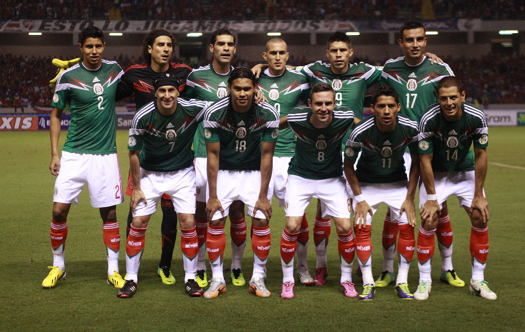 FILE- In this Oct. 15, 2013 file photo, Mexico's team poses prior to the start the 2014 World Cup qualifying soccer match between Costa Rica and Mexico, in San Jose, Costa Rica. Background from left: Hugo Ayala, Guillermo Ochoa, Rafael Marquez, Jorge Torr
