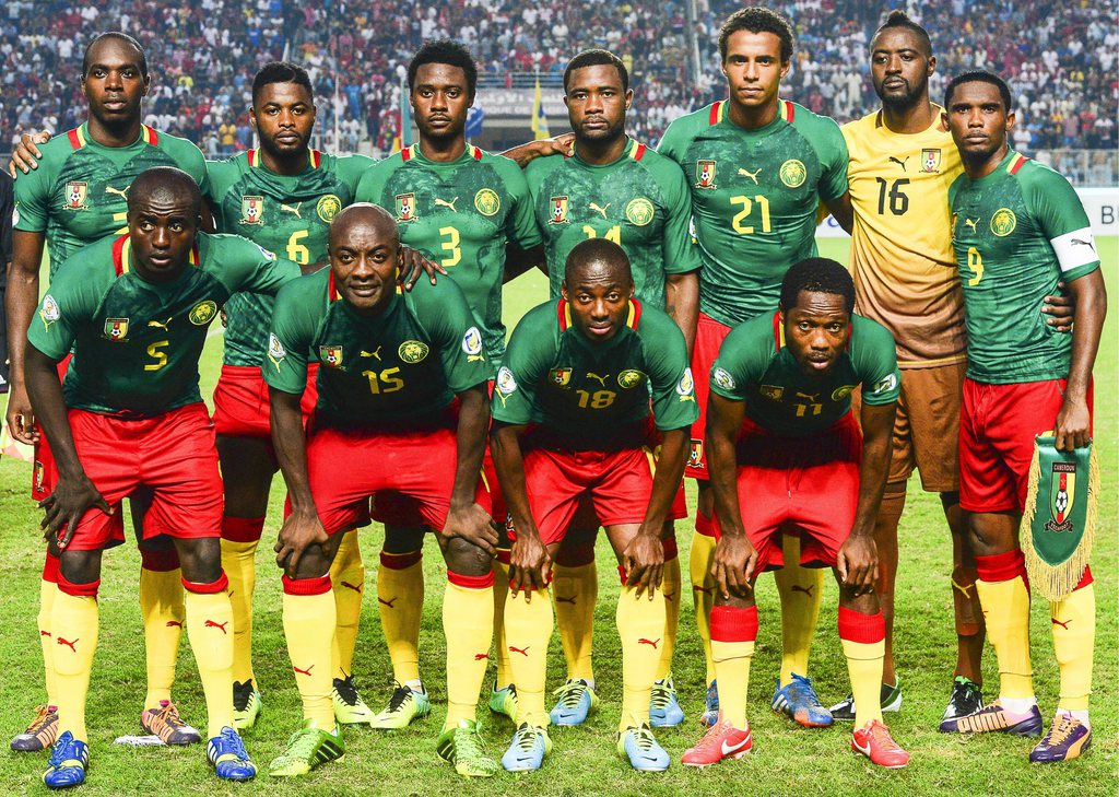 epa03968723 FIFA WORLD CUP 2014 TEAMS....Picture taken on 13 October 2013 shows Cameroonian national soccer team players (front row, L-R) Dany Nounkeu, Pierre Webo, Eyong Enoh and Jean Makoun; (back row, L-R) Allan Nyom, Alex Song, Nicolas N'Koulou, Aurel