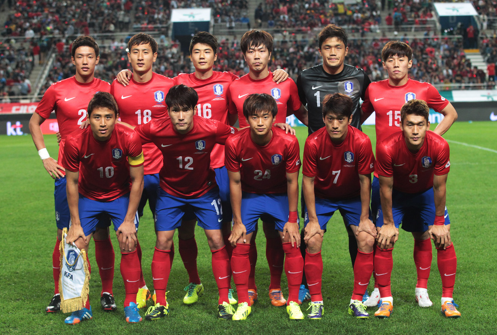 FILE - In this Oct. 12, 2013 file photo South Korea soccer team poses prior to the start their friendly soccer match against Brazil at World Cup Stadium in Seoul, South Korea. Foreground from left: Koo Ja-cheol, Han Kook-young, Kim Jin-su, Lee Chung-yong