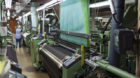 An employee of the weavery Weisbrod-Zuerrer is controlling the weaving machines, pictured on November 11, 2011, in Hausen am
