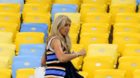 epa04257931 Nicolle Begovic, wife of Bosnia and Herzegovina's national soccer team goalkeeper Asmir Begovic, arrives for a tr