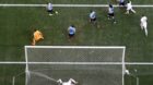 England's Wayne Rooney (bottom) tangles himself in the net after failing to score a goal against Uruguay during their 2014 Wo