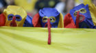 Spectators react as they wait for the start of the World Cup round of 16 soccer match between Costa Rica and Greece at the A