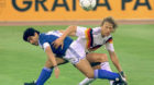 Argentina's Diego Maradona and West Germany's Guido Buchwald tangle with one another during the World Cup soccer final in Rom
