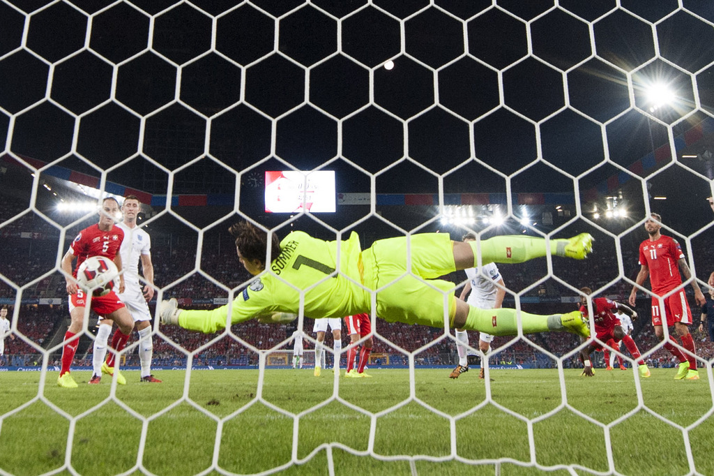 Swiss goalkeeper Yann Sommer stops a ball during the UEFA EURO 2016 qualifying match Switzerland against England at the St. Jakob-Park stadium in Basel, Switzerland, Monday, September 8, 2014. (KEYSTONE/Laurent Gillieron)