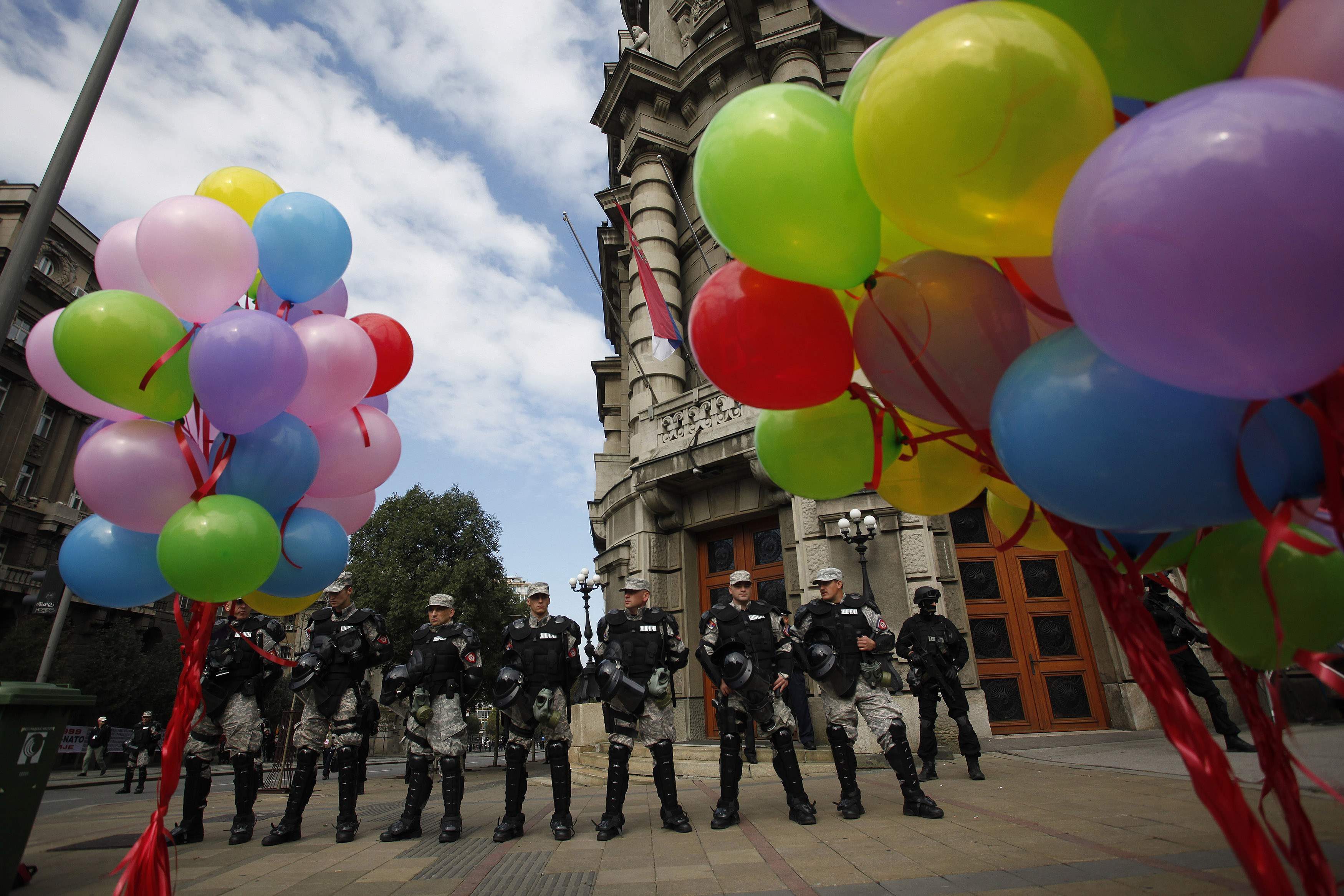 Riot police stand guard during a Pride march in Belgrade, September 28, 2014. Gay rights activists in Serbia held their first Pride march in four years on Sunday, walking through Belgrade streets emptied of traffic and pedestrians by a massive security op