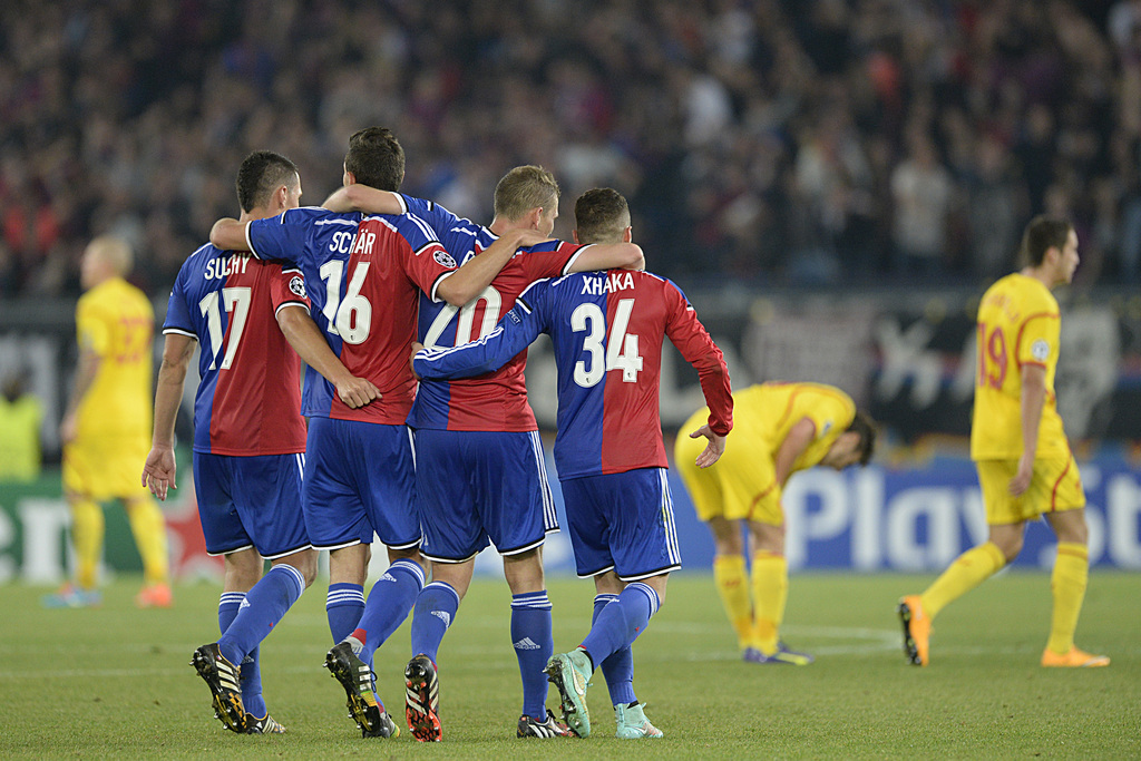 FC Basel's players cheer after winning the UEFA Champions League group B matchday 2 soccer match between Switzerland's FC Basel 1893 and Britain's Liverpool FC in the St. Jakob-Park stadium in Basel, Switzerland, on Wednesday, October 1, 2014. (KEYSTONE/G