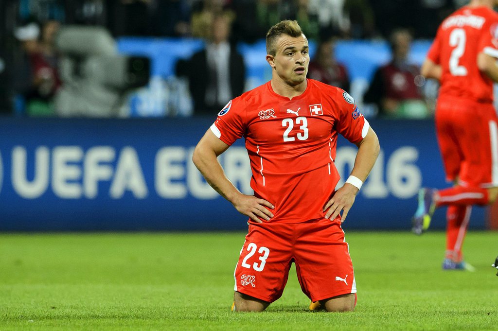 epa04438973 Swiss forward Xherdan Shaqiri reacts after missing a chance during the UEFA EURO 2016 qualifying soccer match between Slovenia and Switzerland in Maribor, Slovenia, 09 October 2014. EPA/LAURENT GILLIERON
