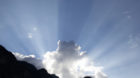 A cloud in front of the sun, pictured on August 30, 2014 in the Leventina valley, Switzerland. (KEYSTONE/Gaetan Bally)
Eine