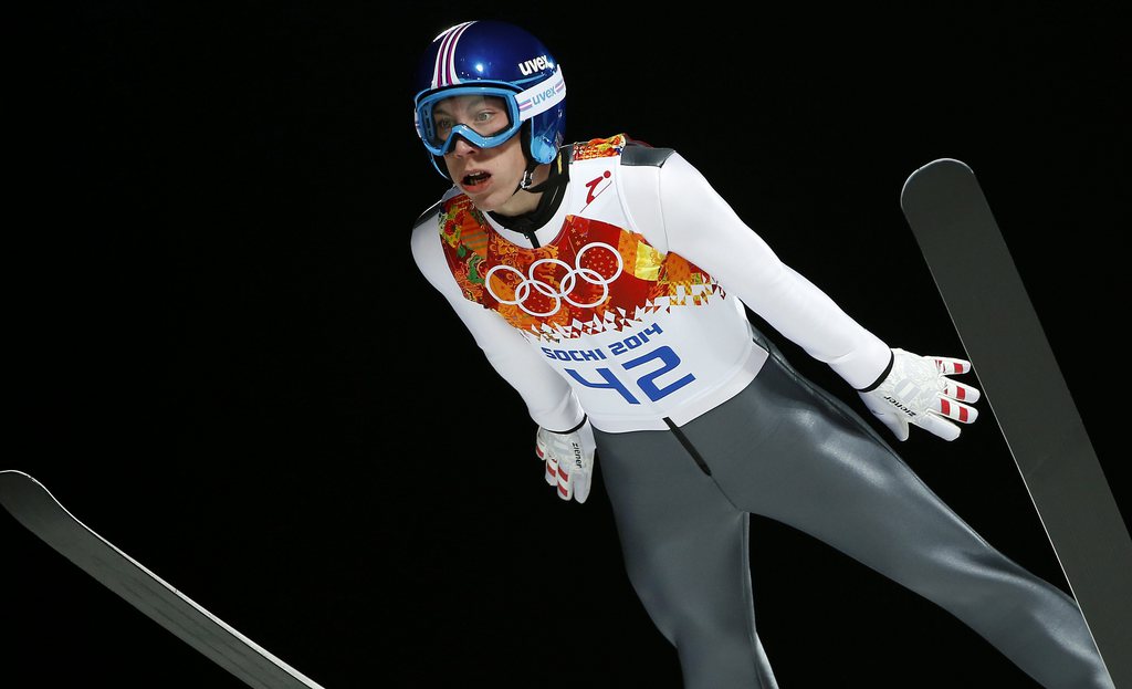 epa04065518 Thomas Diethart of Austria in action during the Normal Hill Ski Jumping competition Gorki Jumping Center at the Sochi 2014 Olympic Games, Krasnaya Polyana, Russia, 09 February 2014. EPA/VALDRIM XHEMAJ