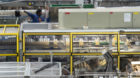 Bottles of Rhaezuenser Plus are on the conveyor belt, pictured on April 16, 2013, in Rhaezuens, canton of Grisons, Switzerlan