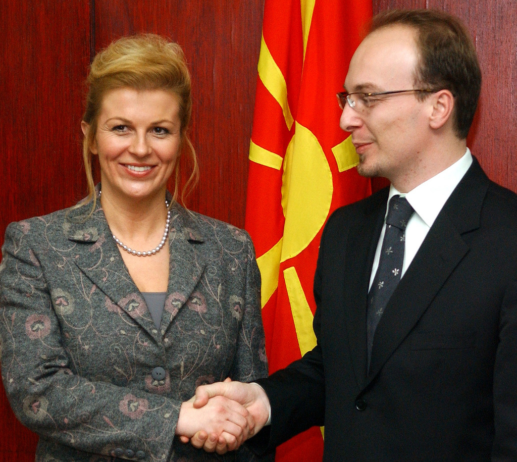 Croatia's Foreign Minister Kolinda Grabar Kitarovic, left, meets her Macedonian counterpart Antonio Milososki, right, upon her arrival in Macedonia's capital Skopje, on Tuesday, Jan. 23, 2007. During her two-day visit to Macedonia, Croatian Minister Grabar Kitarovic will meet the country's top officials. ()