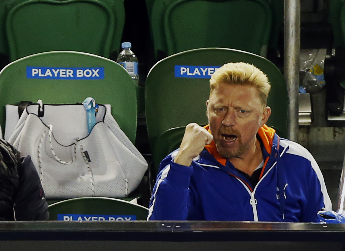 Boris Becker, former tennis player and coach of Novak Djokovic of Serbia, reacts after Djokovic won a point against Stan Wawrinka of Switzerland during their men's singles semi-final match at the Australian Open 2015 tennis tournament in Melbourne January 30, 2015. REUTERS/Brandon Malone (AUSTRALIA - Tags: SPORT TENNIS)