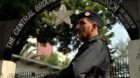 epa04539693 Member of the Pakistani security forces stands guard outside a church as Pakistan's Christian minority celebrate