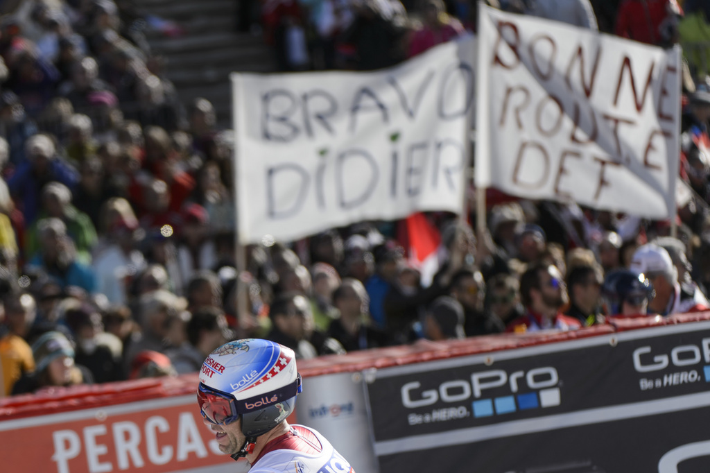 Didier Defago of Switzerland reacts in the finish area during the men's Downhill race of the FIS Alpine Skiing World Cup Finals, in Meribel, France, Wednesday, March 18, 2015. (KEYSTONE/Jean-Christophe Bott)