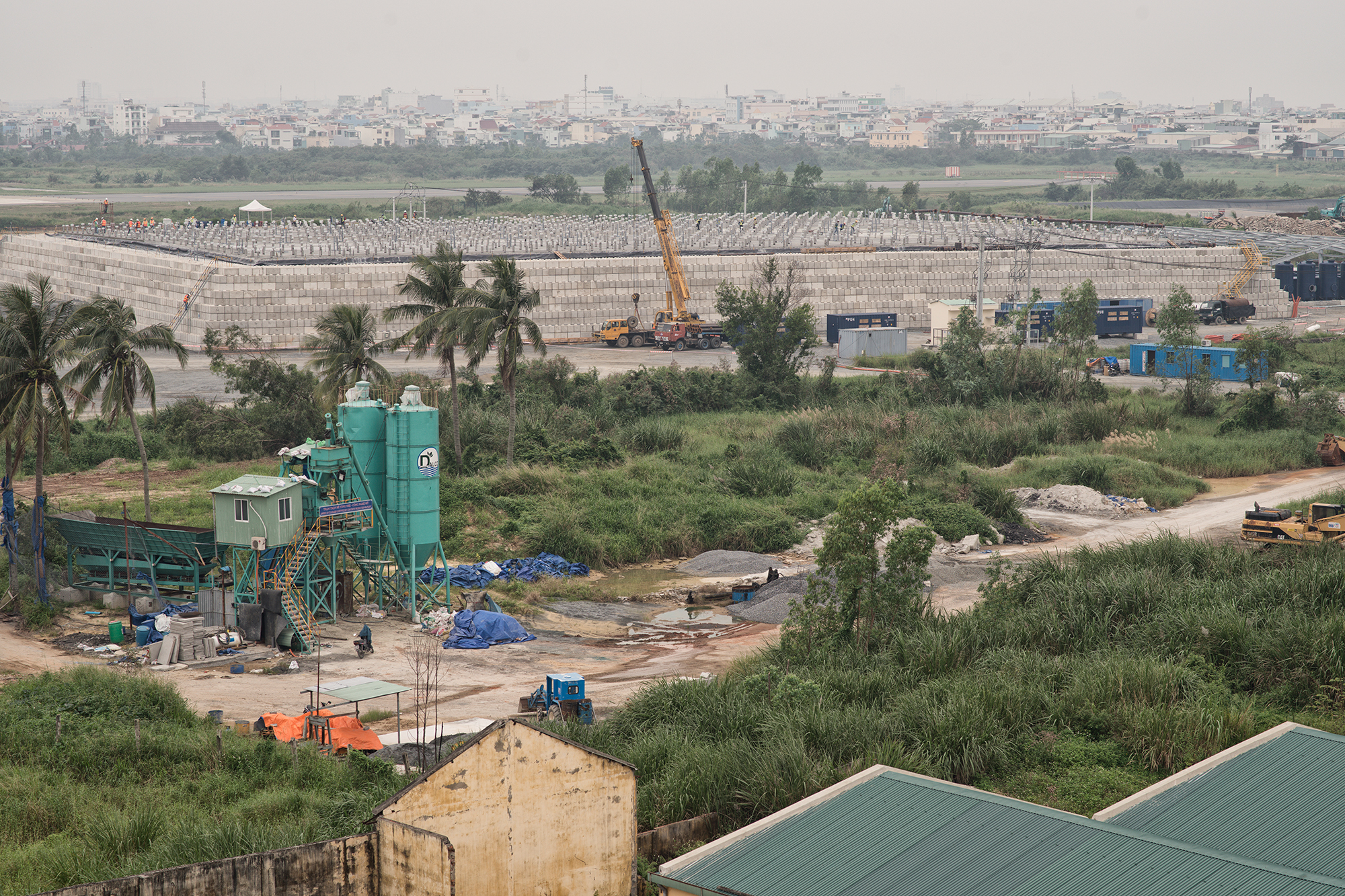 Da Nang. 09.12.2013 - Agent Orange cleanup at the airport. The U.S. Agency for International Development (USAID) has awarded contracts to two U.S. companies to work on the project along with Vietnam defense ministry officials. Oven in which the contanimated earth is heated. Photo by ©Roland Schmid