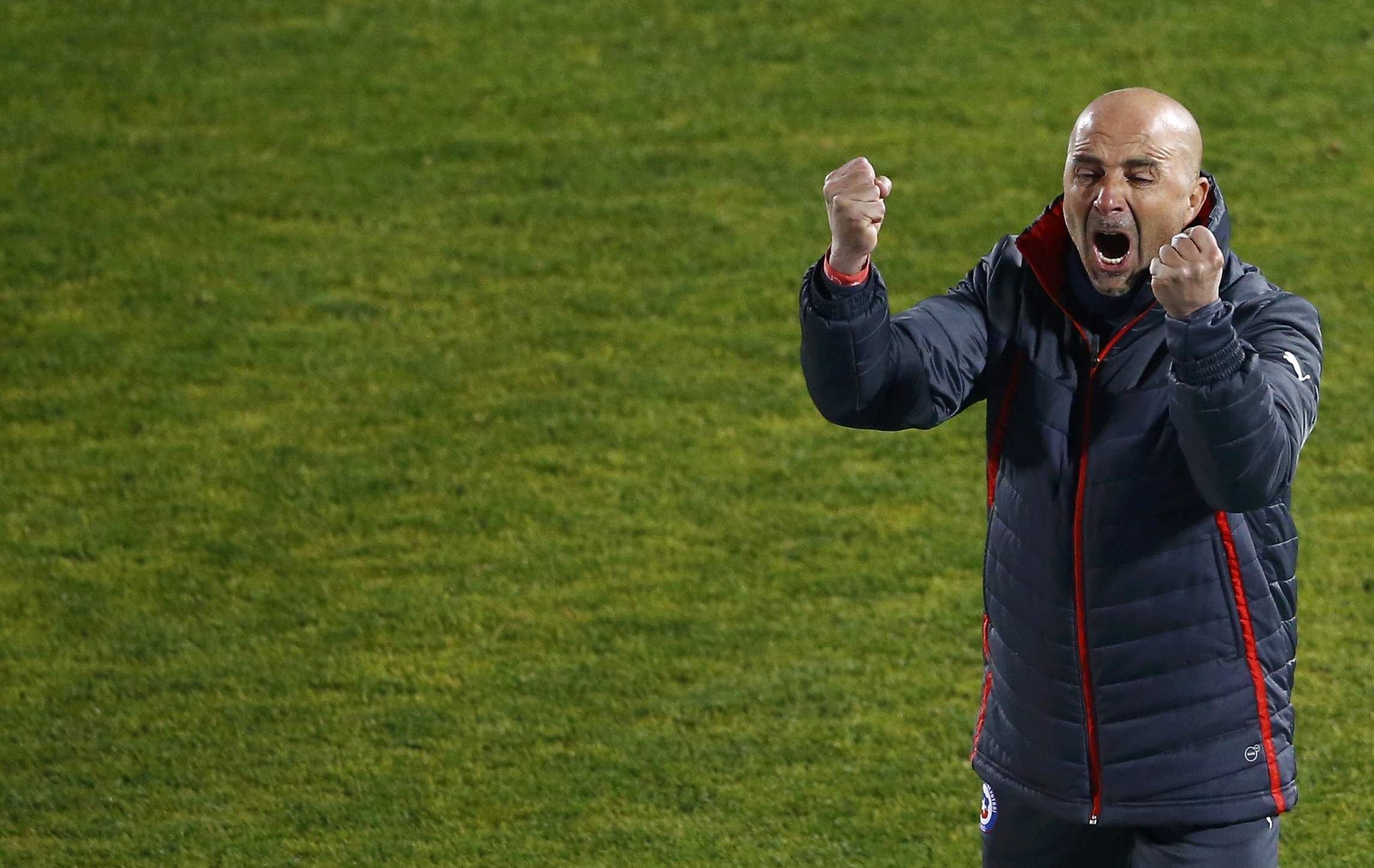 Chile's coach Jorge Sampaoli celebrates after his team defeated Peru during their Copa America 2015 semi-final soccer match at the National Stadium in Santiago, Chile, June 29, 2015. REUTERS/Ricardo Moraes