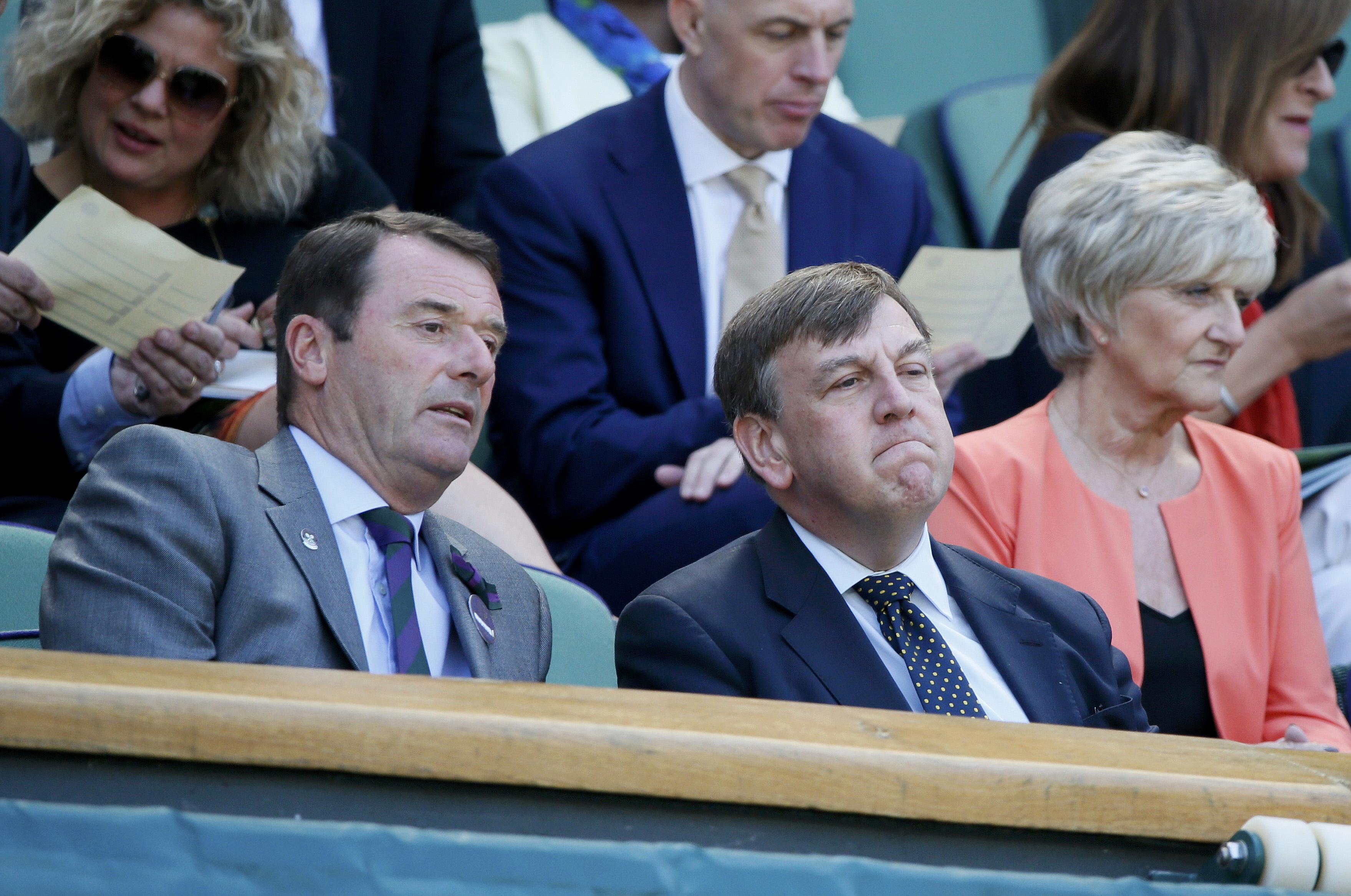 John Whittingdale (C), Secretary of State for Culture, Media and Sport on Centre Court at the Wimbledon Tennis Championships in London, July 9, 2015. REUTERS/Stefan Wermuth