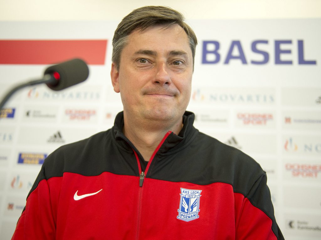 epa04871823 Maciej Skorza, head coach of KKS Lech Poznan, speaks during a press conference at the St. Jakob-Park stadium in Basel, Switzerland, 04 August 2015. Lech Poznan is scheduled to play against FC Basel in an UEFA Champions League third qualifying round second leg soccer match on 05 August 2015. EPA/GEORGIOS KEFALAS