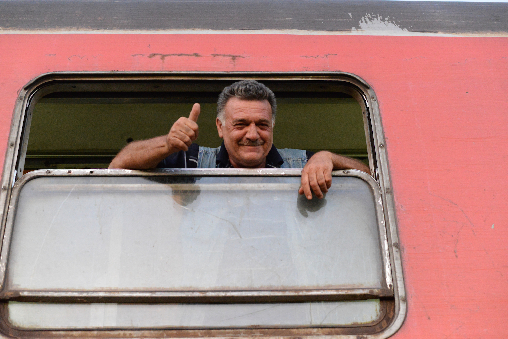 Refugees at the Greek / FYR of Macedonia border on August 31. 2015. On a daily basis thousands of refugees pass the border to get a train, bus or taxi to Serbia