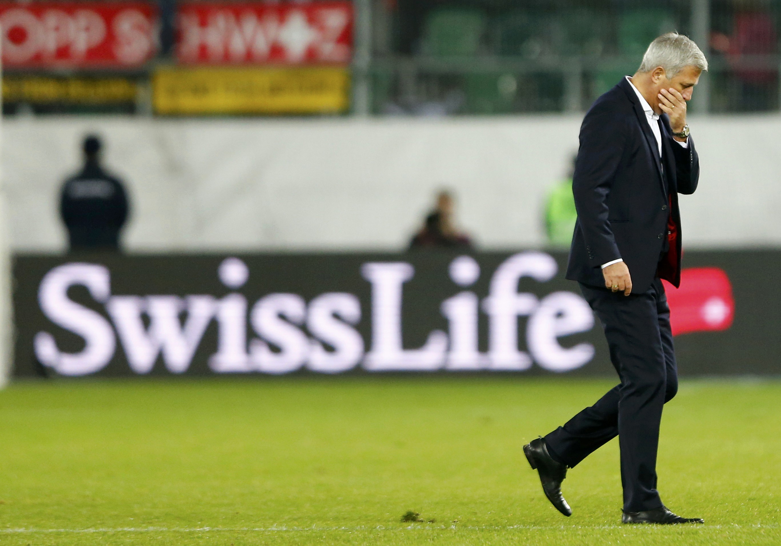 Switzerland's coach Vladimir Petkovic walks on the pitch after their Euro 2016 Group E qualifying soccer match against San Marino's in St. Gallen, Switzerland October 9, 2015. REUTERS/Arnd Wiegmann