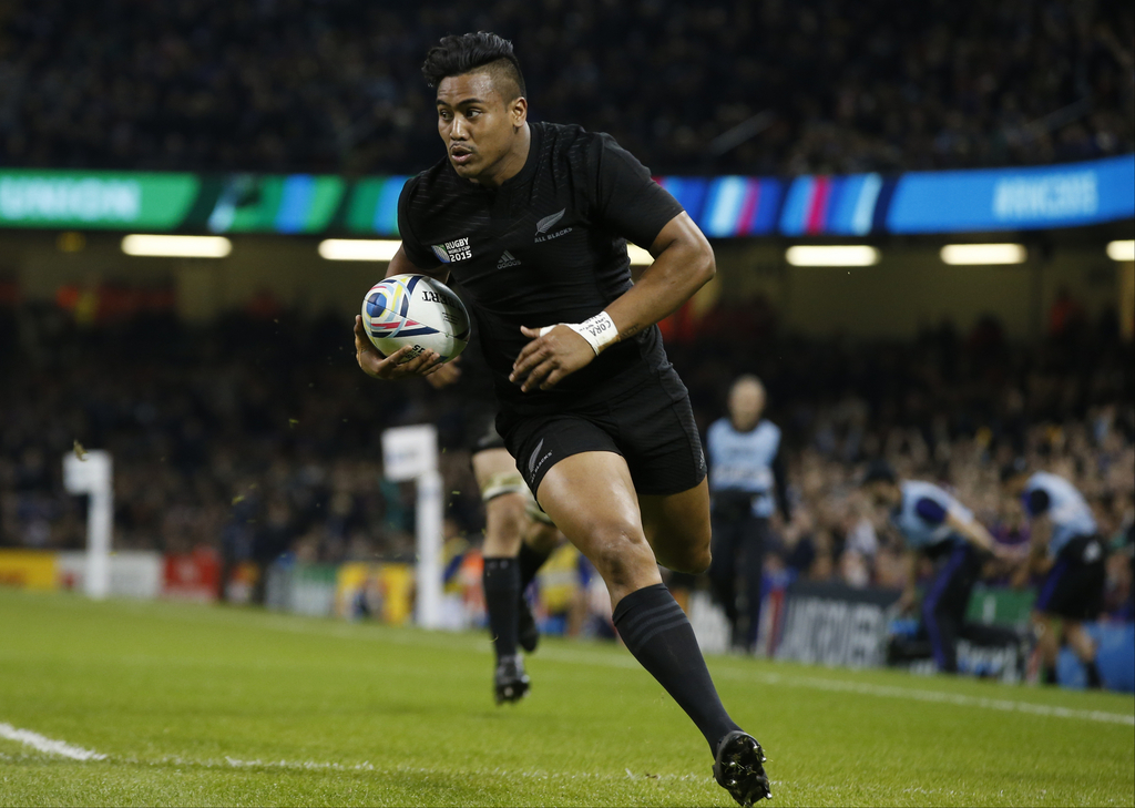 FILE - In this file photo dated Saturday, Oct. 17, 2015, New Zealand's Julian Savea scores a try during the Rugby World Cup quarterfinal match between New Zealand and France at the Millennium Stadium, Cardiff. Stunning skill by winger Julian Savea bought an audible gasp from fans around Millennium Stadium. (AP Photo/Alastair Grant, FILE)
