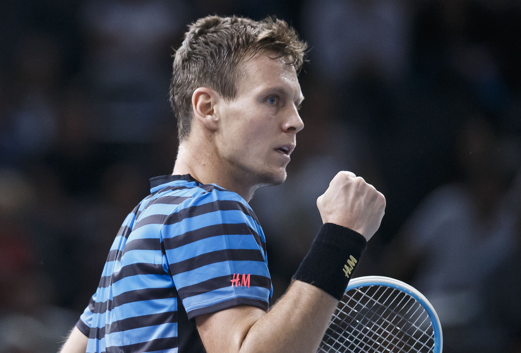 Tomas Berdych of the Czech Republic celebrates as he is winning a point against Jo-Wilfried Tsonga of France during their third round match of the BNP Masters tennis tournament at the Paris Bercy Arena, in Paris, France, Thursday, Nov. 5, 2015. (AP Photo/Michel Euler)