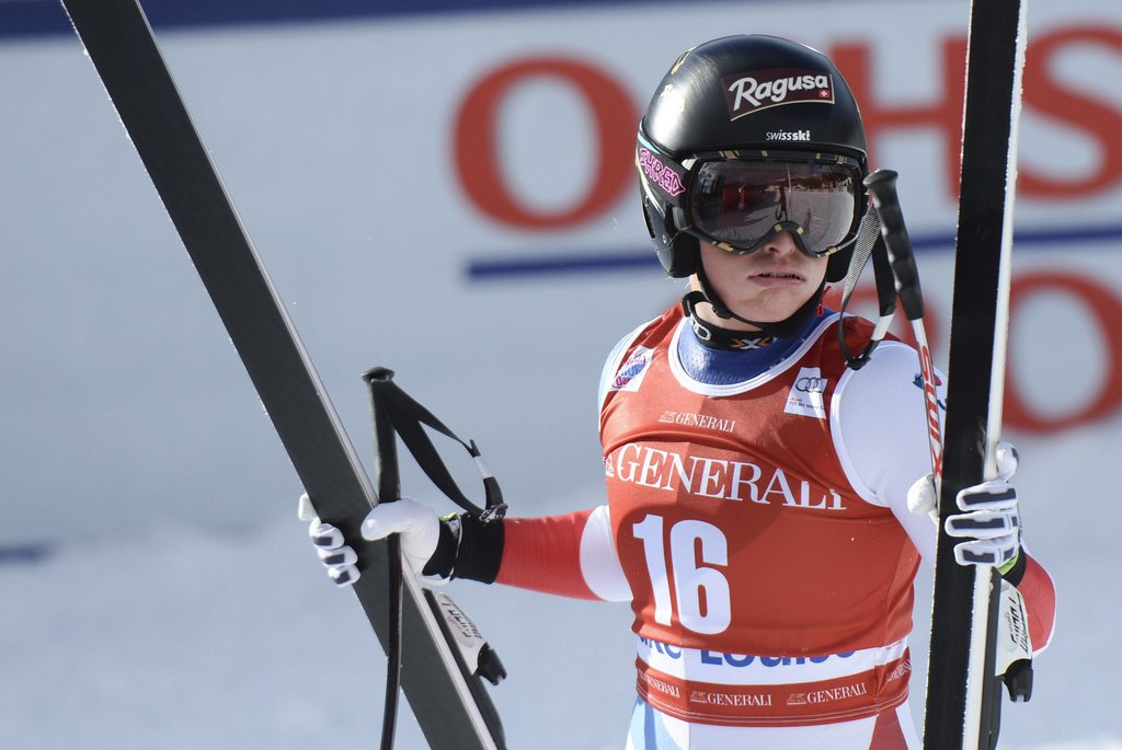 epa05055034 Lara Gut of Switzerland leaves the finish area at the Women's World Cup downhill ski race in Lake Louise, Alberta, Canada, 04 December 2015. EPA/MIKE STURK
