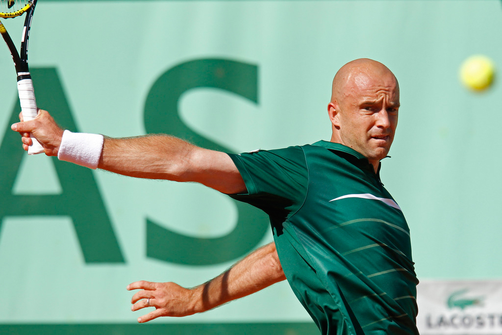 ARCHIVBILD ZU NEUEM FEDERER COACH LJUBICIC --- Ivan Ljubicic of Croatia returns against Fernando Verdasco of Spain in his third round match at the French Open tennis tournament in Roland Garros stadium in Paris, Saturday May 28, 2011. (AP Photo/Christophe Ena)