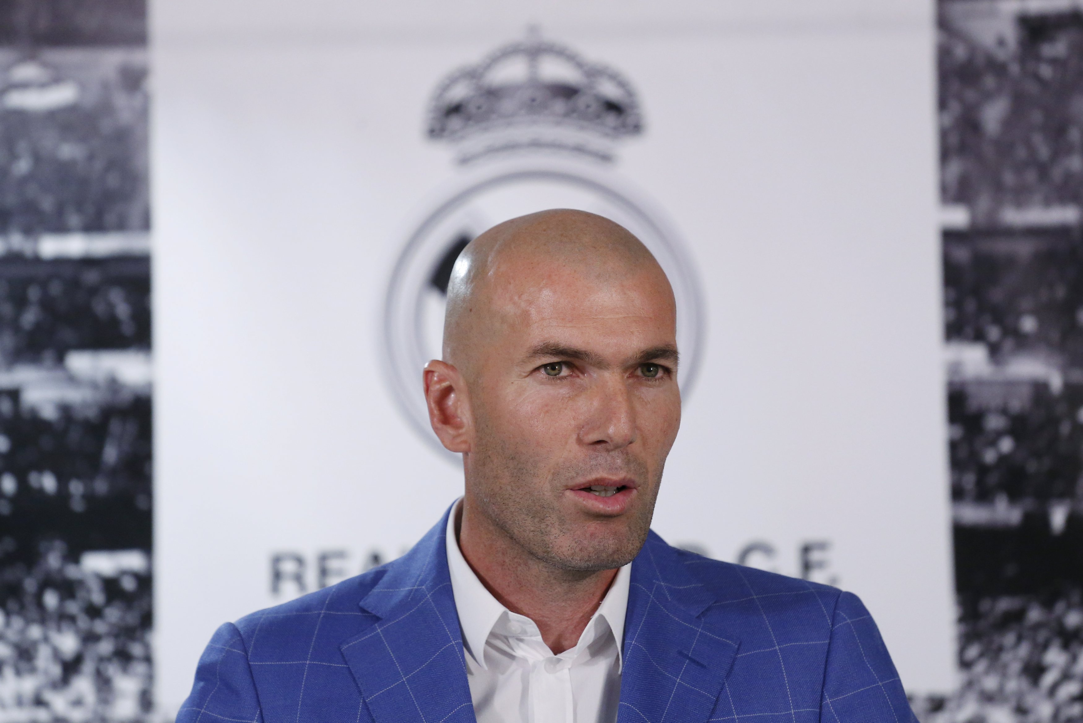 Real Madrid's new coach Zinedine Zidane appears before the media at Santiago Bernabeu stadium in Madrid, Spain, January 4, 2016. Real Madrid have sacked coach Rafa Benitez after less than half a season in charge and promoted former France and Real great Zidane from the B team to replace him, president Florentino Perez said on Monday. REUTERS/Juan Medina