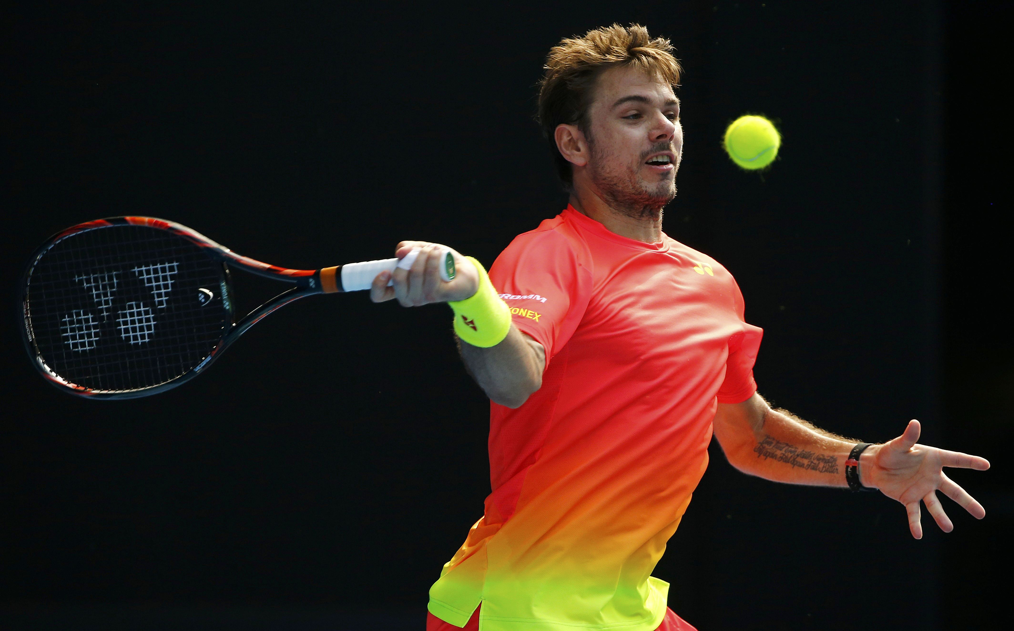 <p>Switzerland's Stan Wawrinka hits a shot during his fourth round match against Canada's Milos Raonic at the Australian Open tennis tournament at Melbourne Park, Australia, January 25, 2016. REUTERS/Thomas Peter</p>