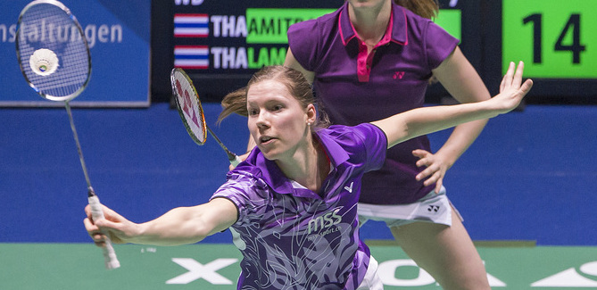 Switzerland's Ayla Huser, back, and Sabrina Jaquet, front, return a shuttlecock to Thailand's Savitree Amitrapai and Narissapat Lam during their women's doubles match at the Badminton Swiss Open tournament in the St. Jakobshalle in Basel, Switzerland, on Wednesday, March 12, 2014. (KEYSTONE/ Georgios Kefalas)