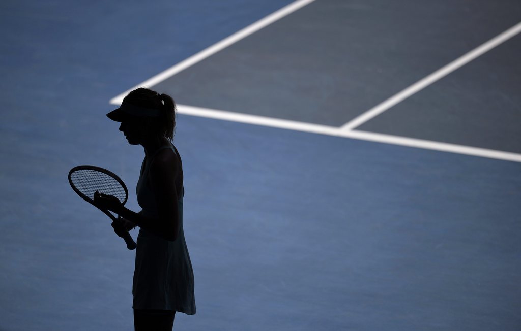 epa05199987 (FILES) Maria Sharapova of Russia is silhouetted during her second round match against Karin Knapp of Italy at the Australian Open Grand Slam tennis tournament in Melbourne, Australia, 16 January 2014. Maria Sharapova revealed that she failed a drug test being tested positive for Meldonium at the Australian Open at a press conference in Los Angeles, USA, on 07 March 2016. The anti-ischemic drug 'Meldonium' has been added to the latest list of forbidden susbtances issued by the World Anti Doping Agency (WADA), which has added caffeine and nicotine to substances it is monitoring. EPA/FRANCK ROBICHON