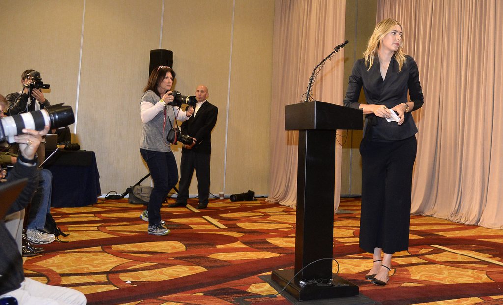 epa05200061 Russian tennis player Maria Sharapova leaves after a press conference at the LA Downtown Hotel in Los Angeles, California, USA, 07 March 2016. Maria Sharapova revealed that she failed a drug test being tested positive for Meldonium at the Australian Open at a press conference in Los Angeles, USA, on 07 March 2016. The anti-ischemic drug 'Meldonium' has been added to the latest list of forbidden susbtances issued by the World Anti Doping Agency (WADA), which has added caffeine and nicotine to substances it is monitoring. EPA/MIKE NELSON