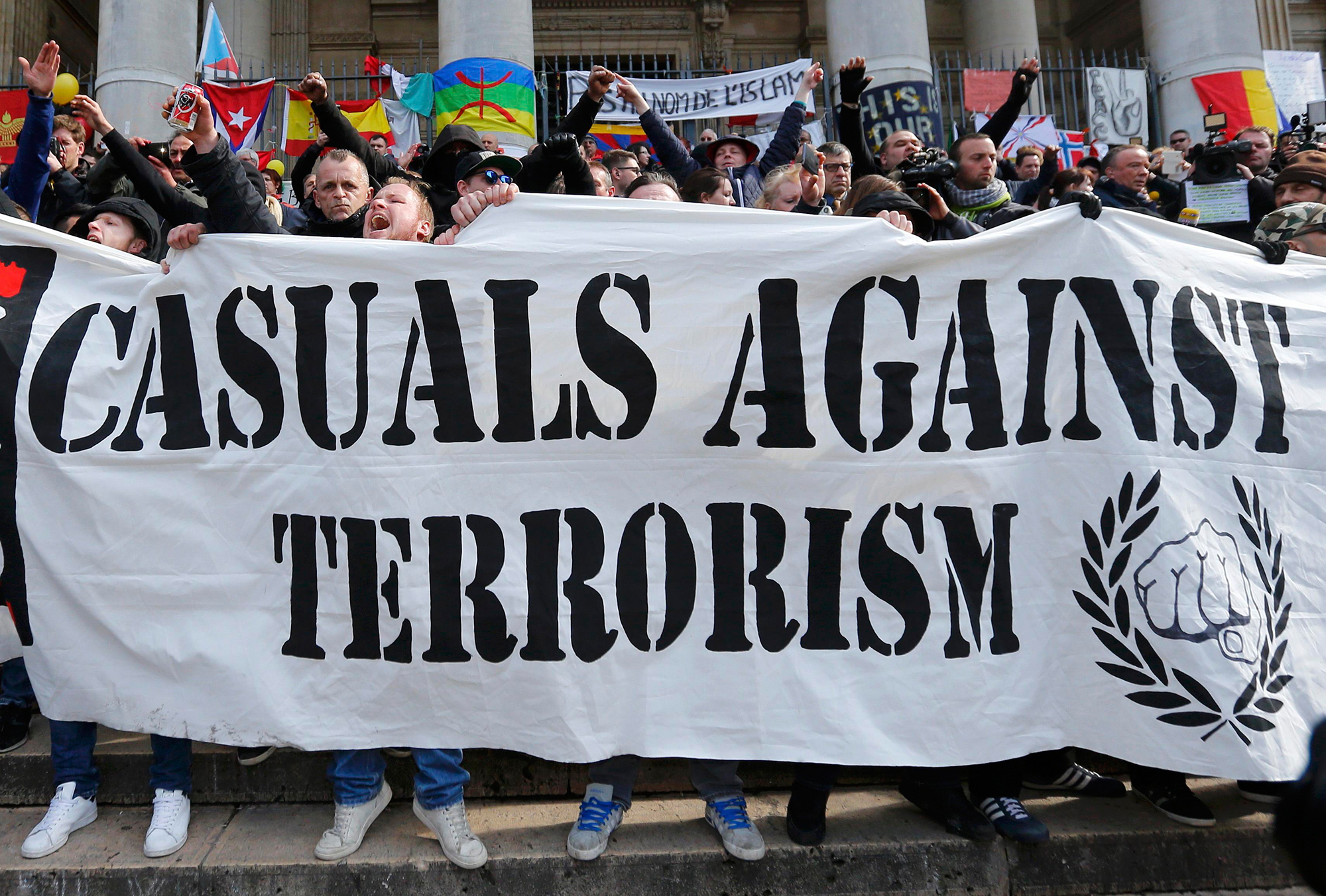 Right-wing demonstrators protest against terrorism in front of the old stock exchange in Brussels, Belgium. March 27. 2016. REUTERS/YVES HERMAN