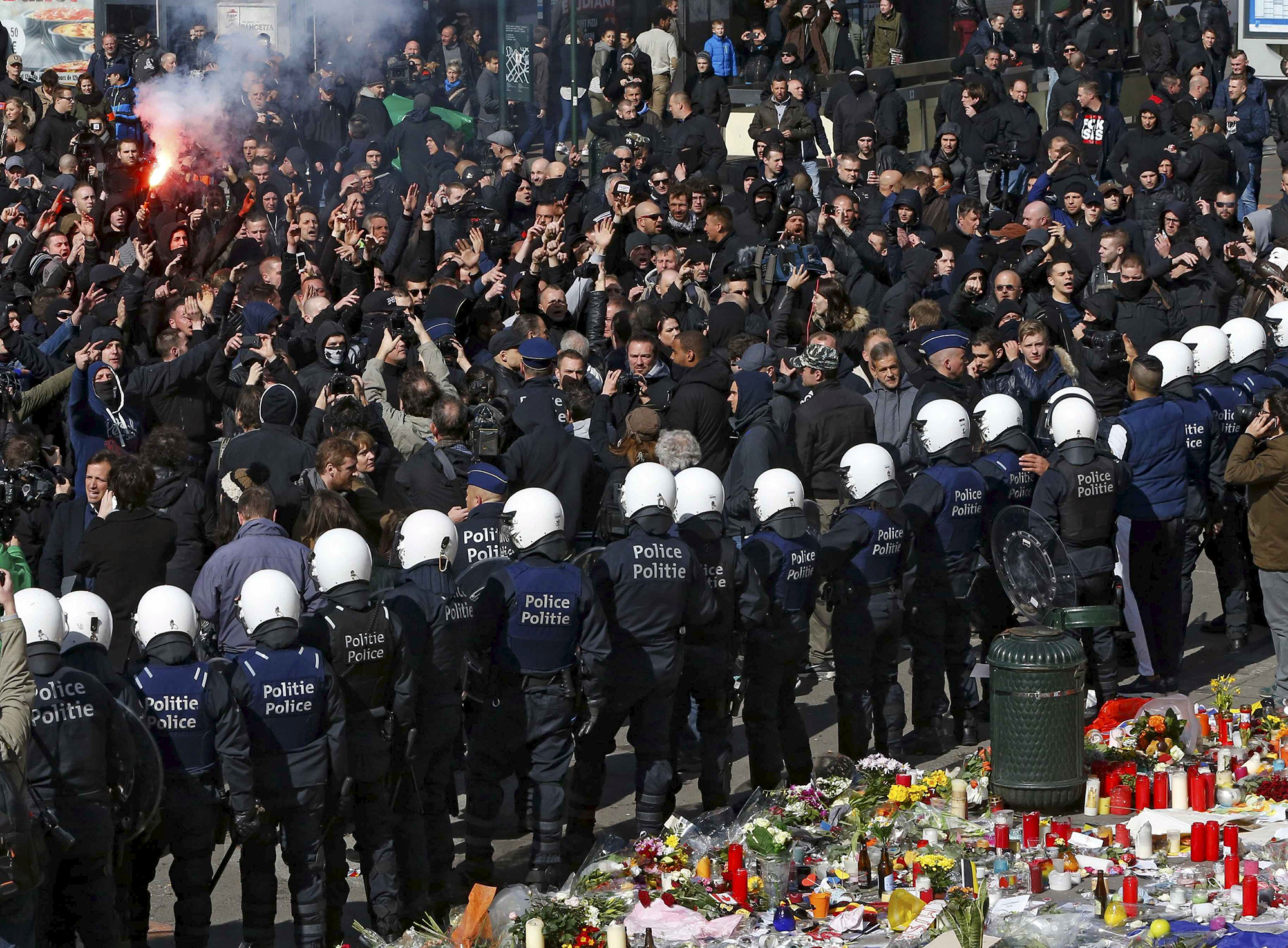 Right-wing demonstrators protest against the wave of terrorism in front of the old stock exchange in Brussels, Belgium. March 27. 2016. REUTERS/Yves Herman TPX IMAGES OF THE DAY
